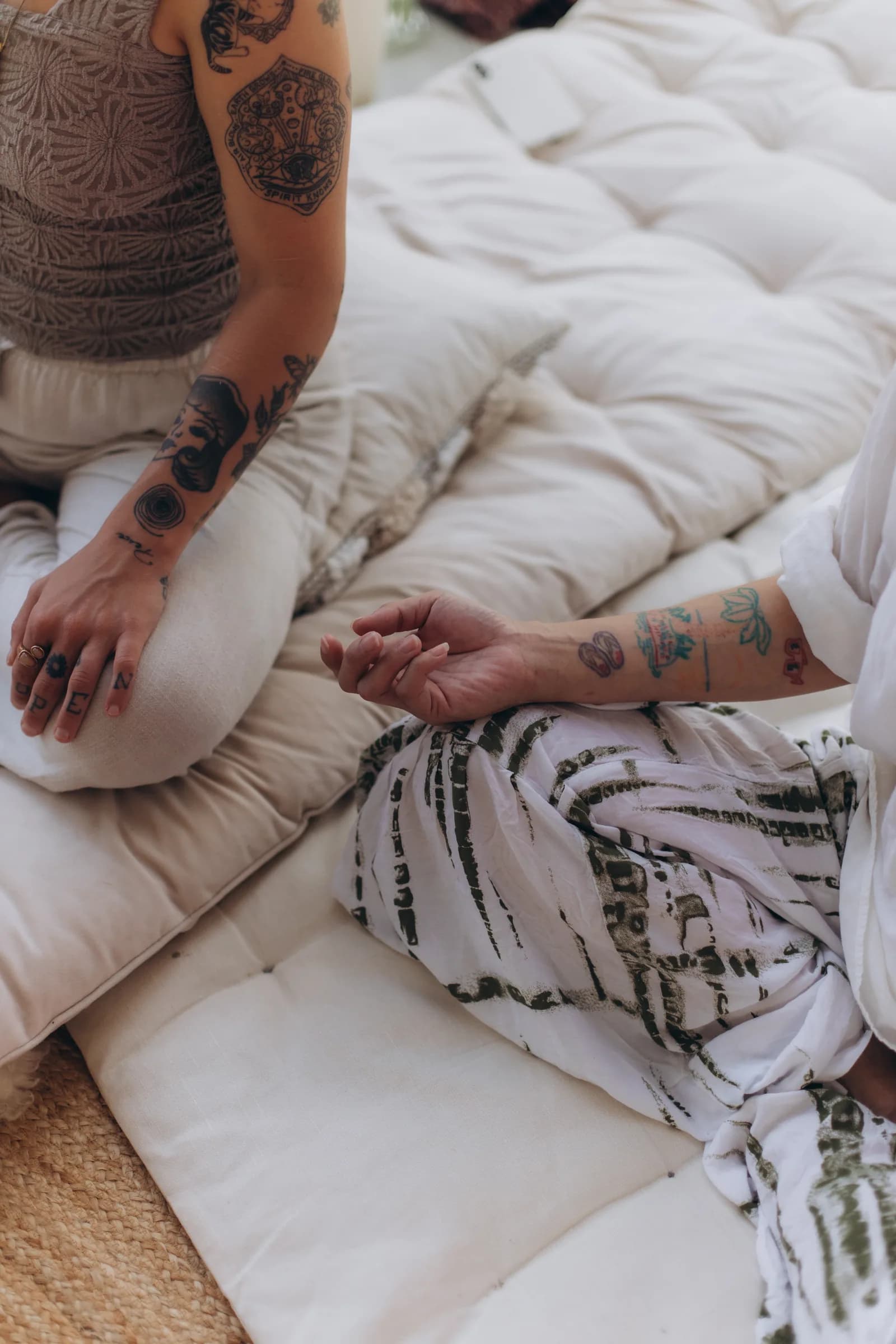 Hands open in a lap at the close of a session